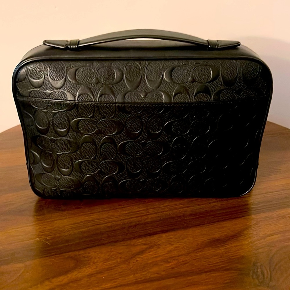 Coach Men hand bag.